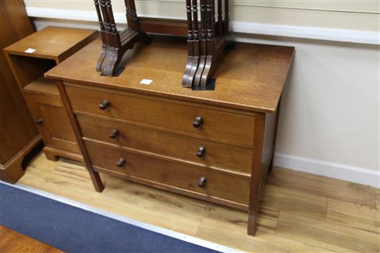 A pair of Gordon Russell oak chests, fitted with three long drawers W.99cm
